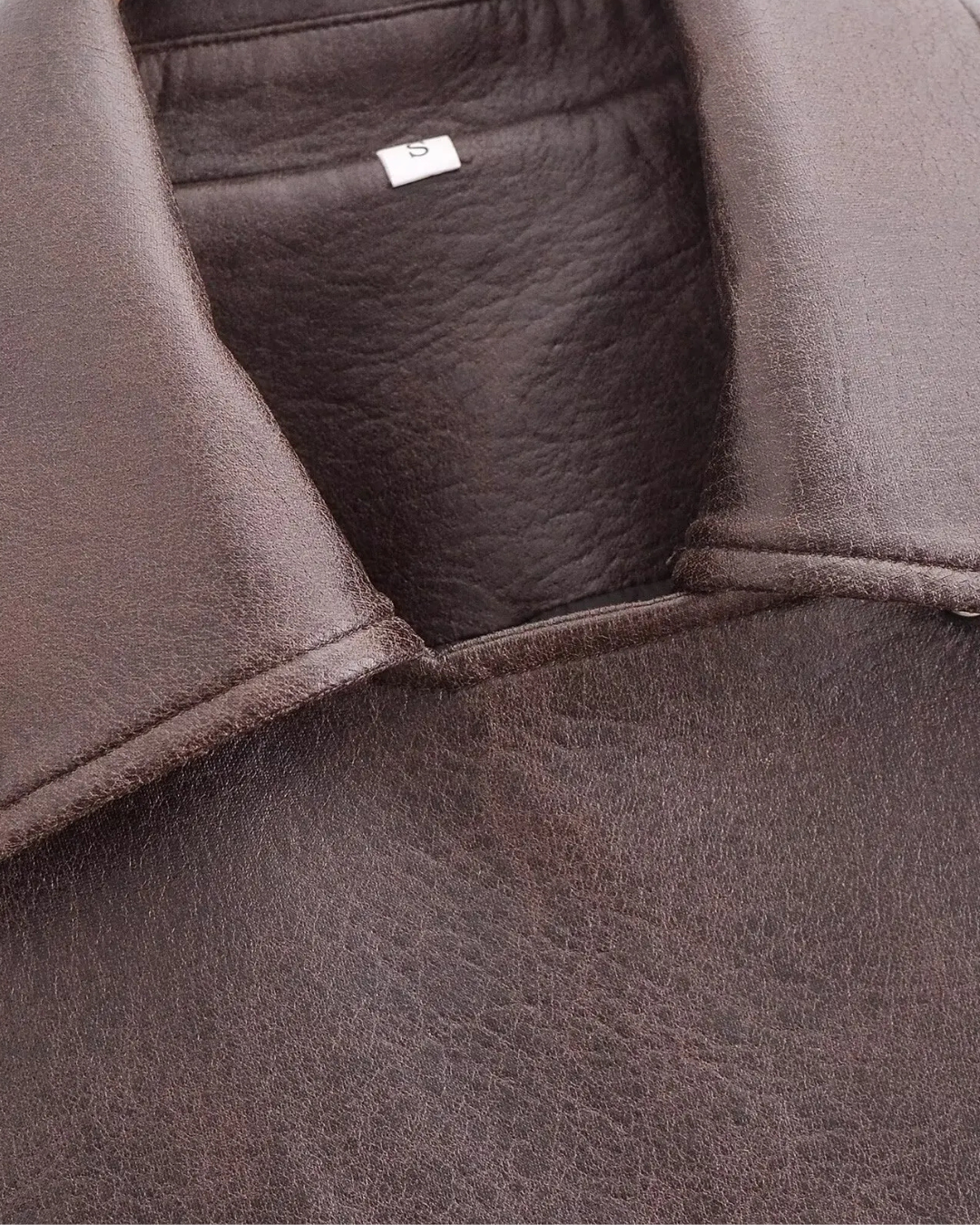 Aria | Elegante Damen-Cropped-Kunstlederjacke mit Gürtel